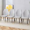 4 light gray modern dining chairs with stylish PU patterned backrest and black metal legs for a comfortable home experience in the kitchen