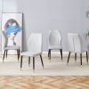 4 light gray modern dining chairs with stylish PU patterned backrest and black metal legs for a comfortable home experience in the kitchen